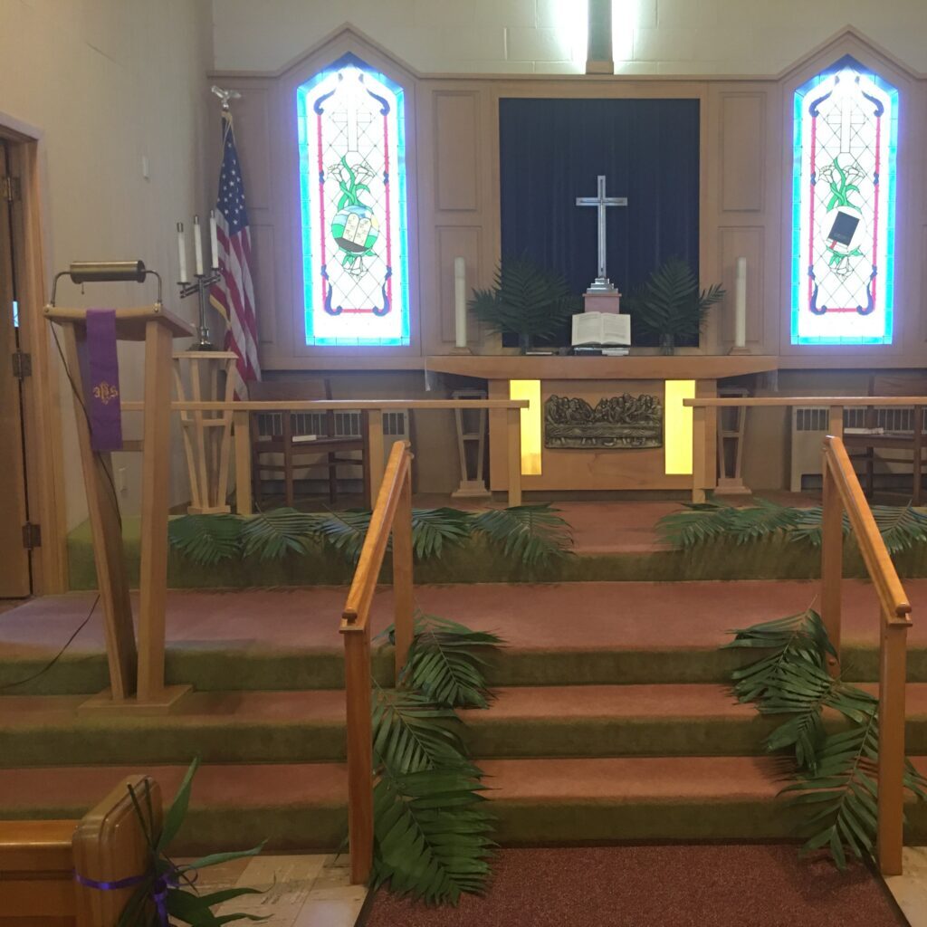 Interior picture of the church, showing the front altar/communion area.